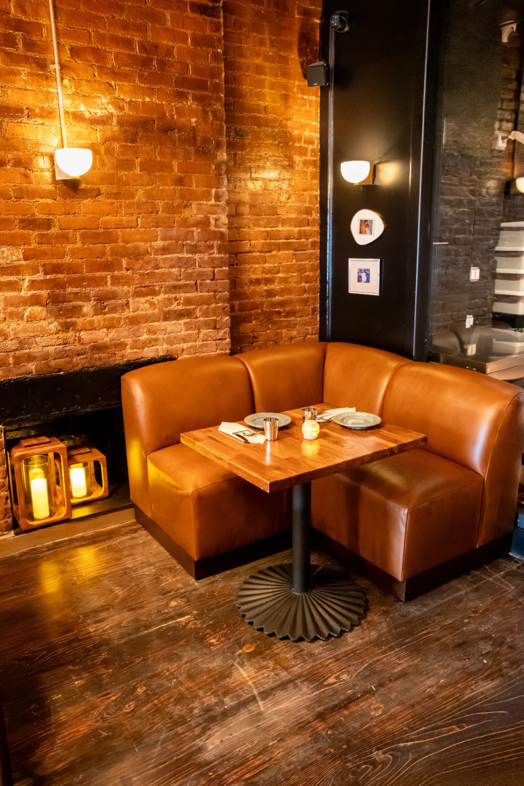 Cozy leather booth with warm lantern light